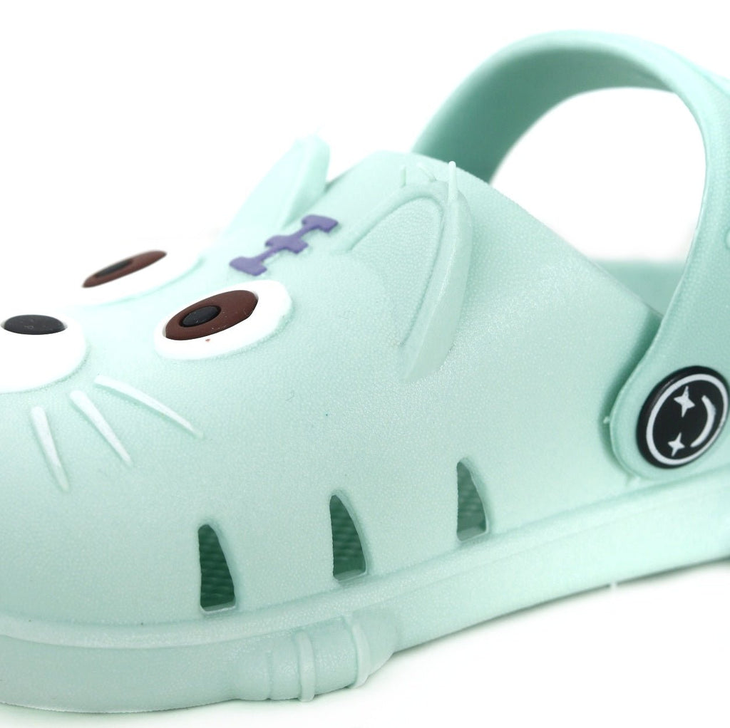 Close-Up of Kids' Mint Green Puppy Clogs with Charming Facial Features