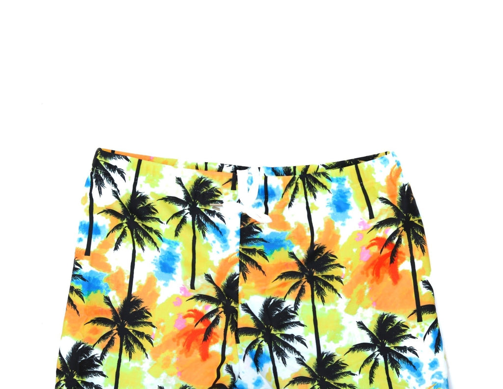Up-close detail of Yellow Bee Boys' Trunks showcasing the tropical palm print.