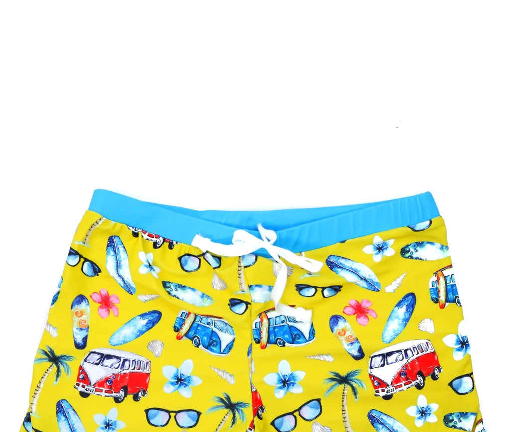 Top View of Yellow Bee Boys' Swim Trunks with Beach and Van Prints, ready for the holidays.