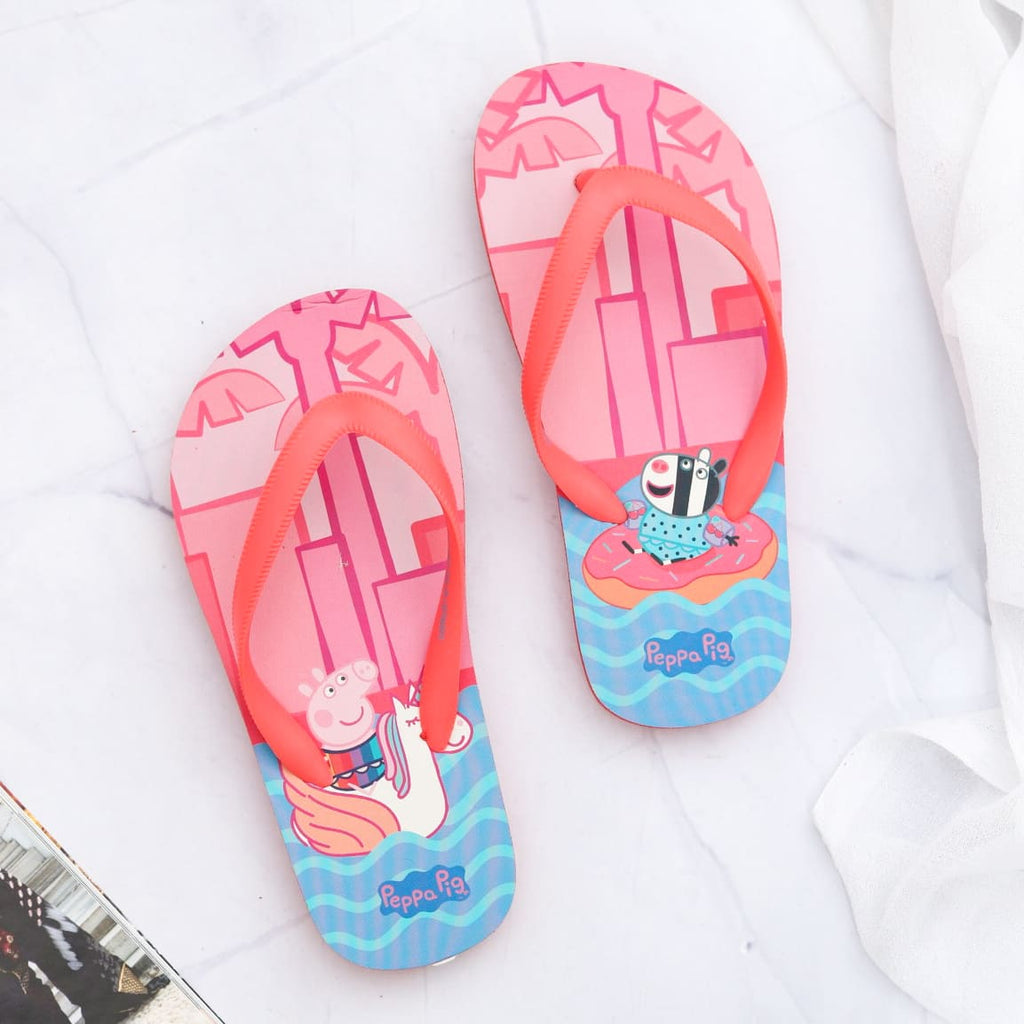 Peppa Pig red flip-flops for girls with blue aquatic-patterned straps and a playful pool party character design on the insole.