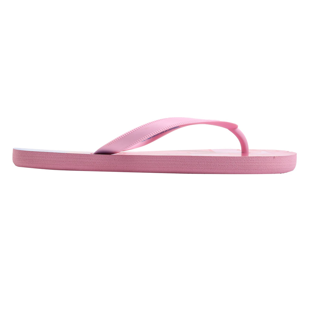 Side profile of a single girl's Peppa Pig flip-flop with a pool party print, showing the thickness of the sole and the curved shape of the comfortable strap.