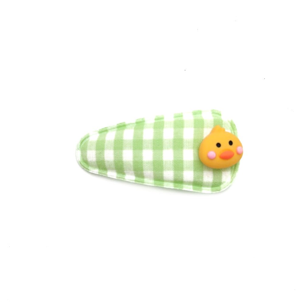Cute aqua hair clip with a chick embellishment for a playful touch by Yellow Bee.