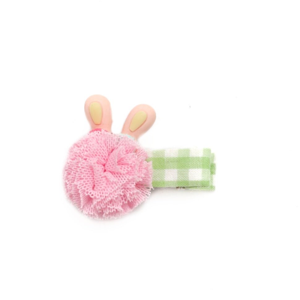 Charming aqua hair clip featuring a bunny pom, part of Yellow Bee's girls' collection.