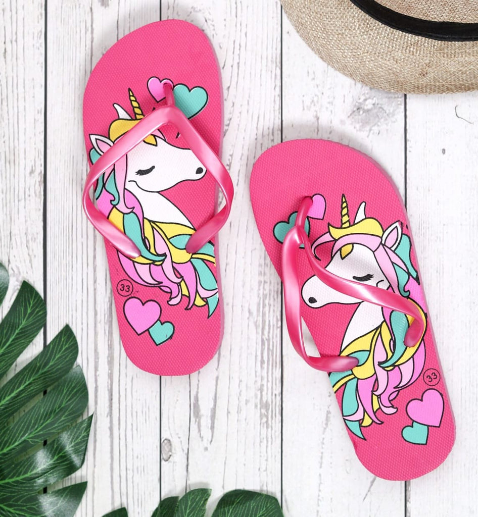 Whimsical unicorn-themed flip-flops in dark pink, showcasing vibrant hearts and a dreamy unicorn illustration.