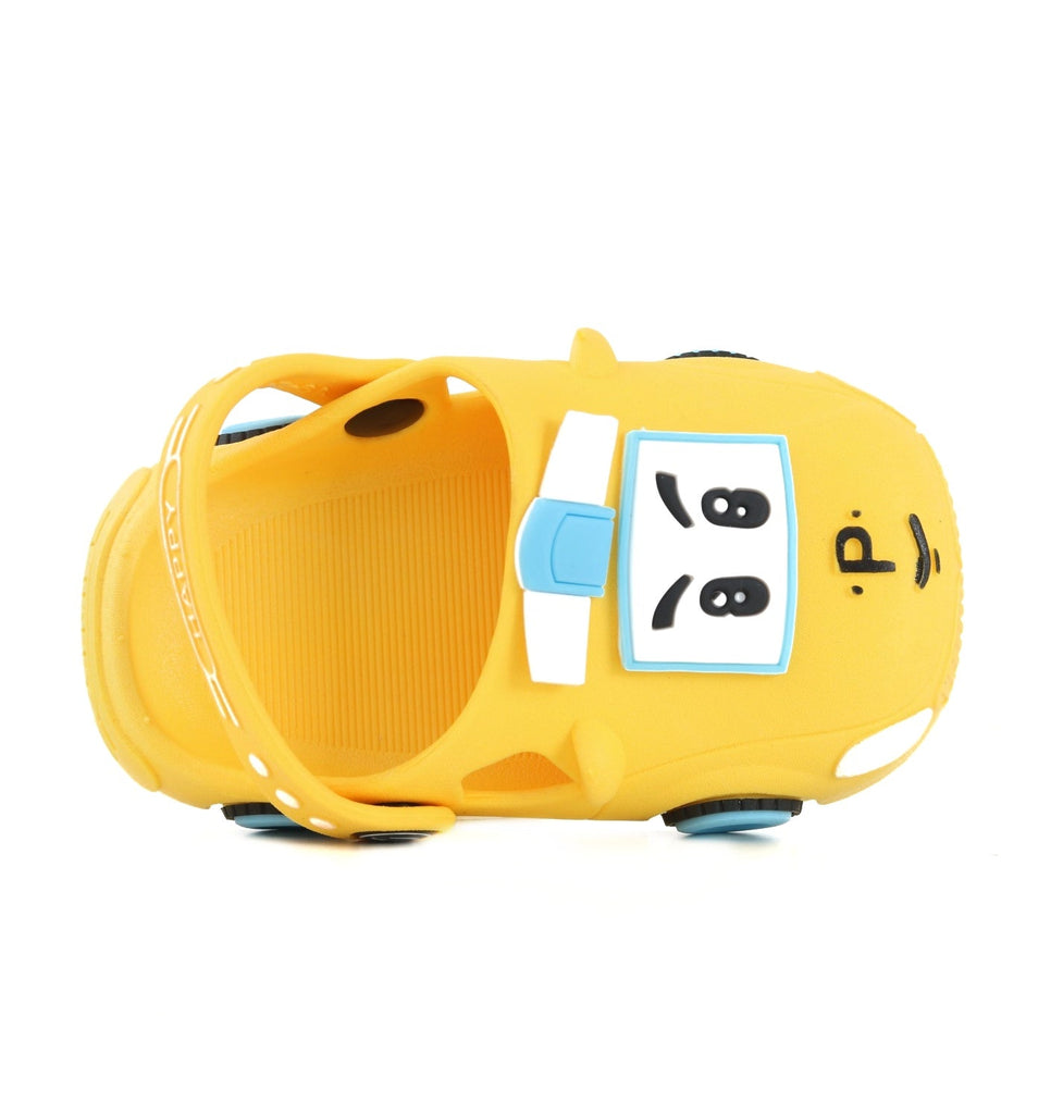 Overhead view of the cheerful yellow car pattern clogs for boys.