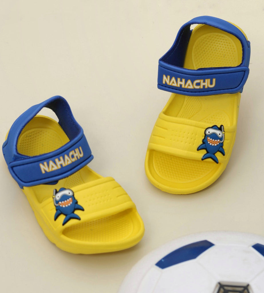 Yellow Bee's Kids' Yellow and Blue Shark-Themed Sandals on Display