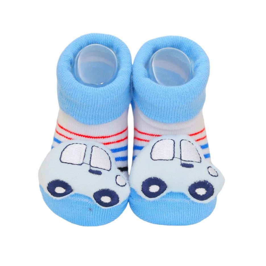 Blue and white infant socks with a cute car stuffed toy, perfect for little explorers.