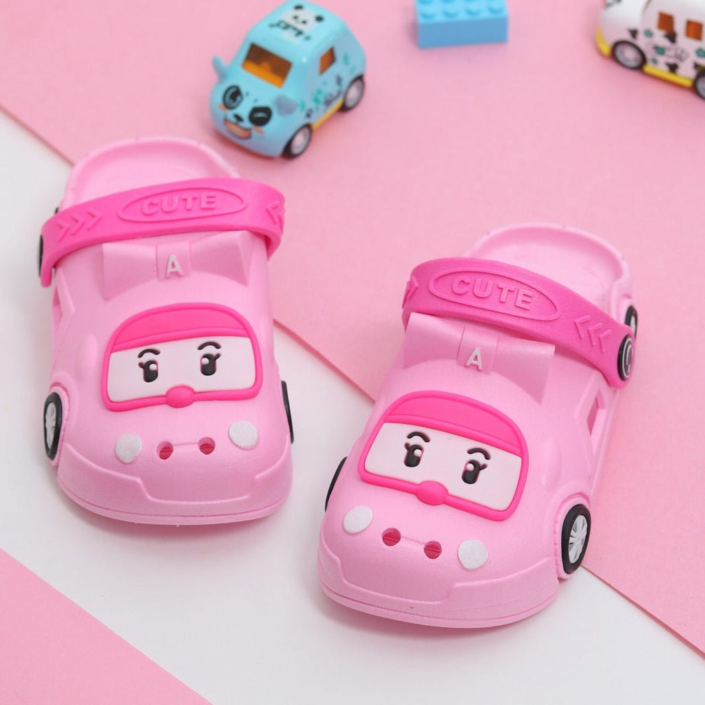 Cute pink kids' clogs with a fun car design and 'CUTE' strap for the little racer in your life.